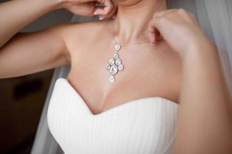 woman wearing diamond necklace