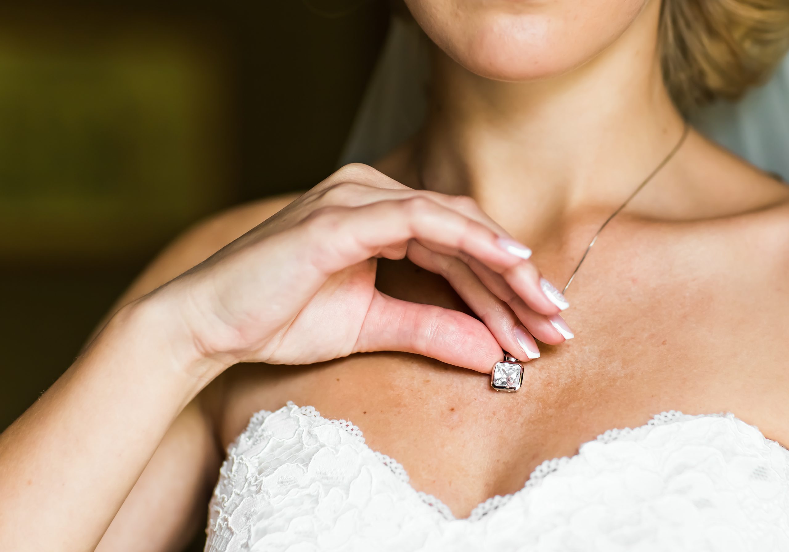 bride wearing diamond necklace