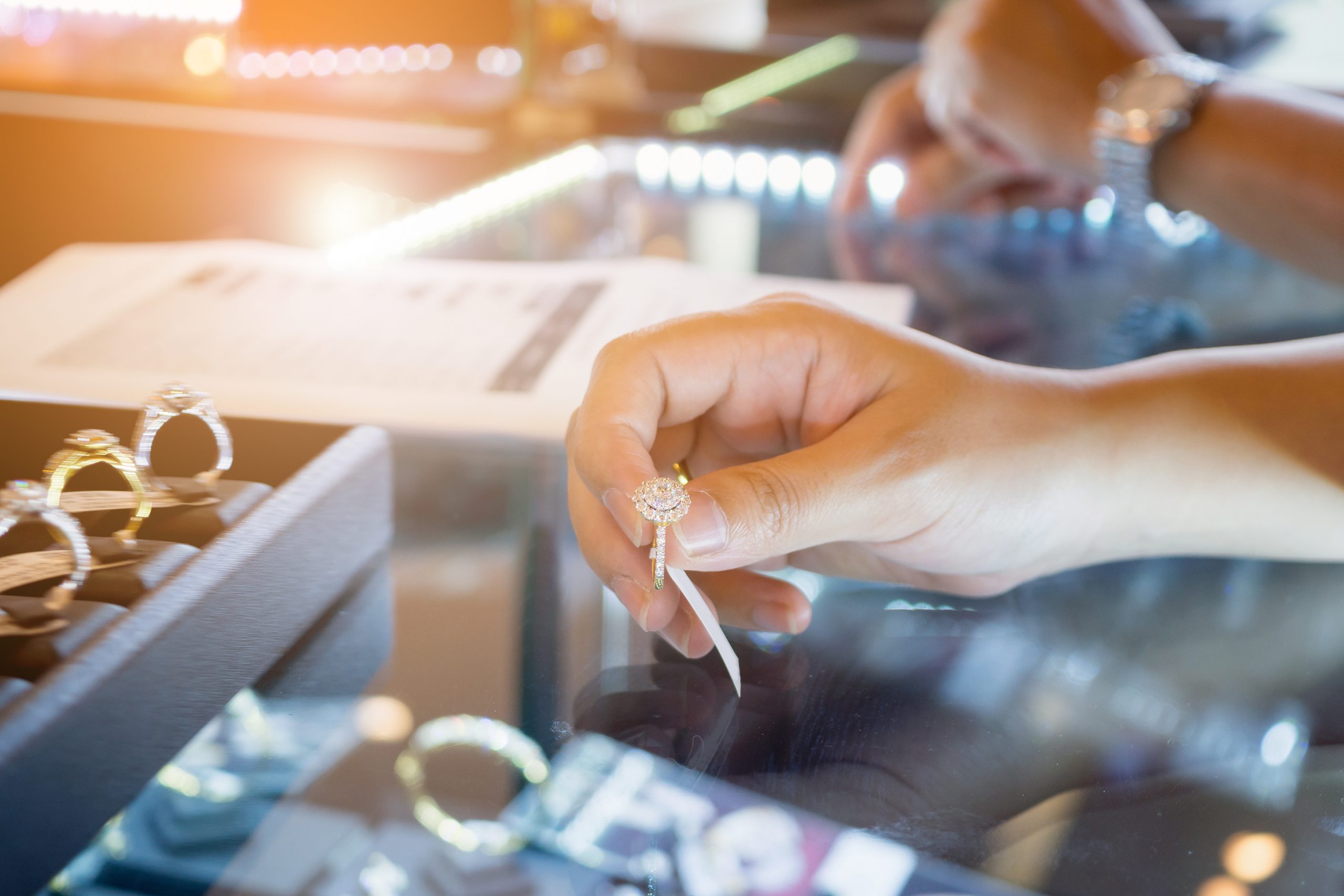 Woman shopping for diamonds at a jewelry store